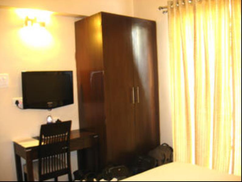 Hotel The Elite Suites Pune Chambre photo