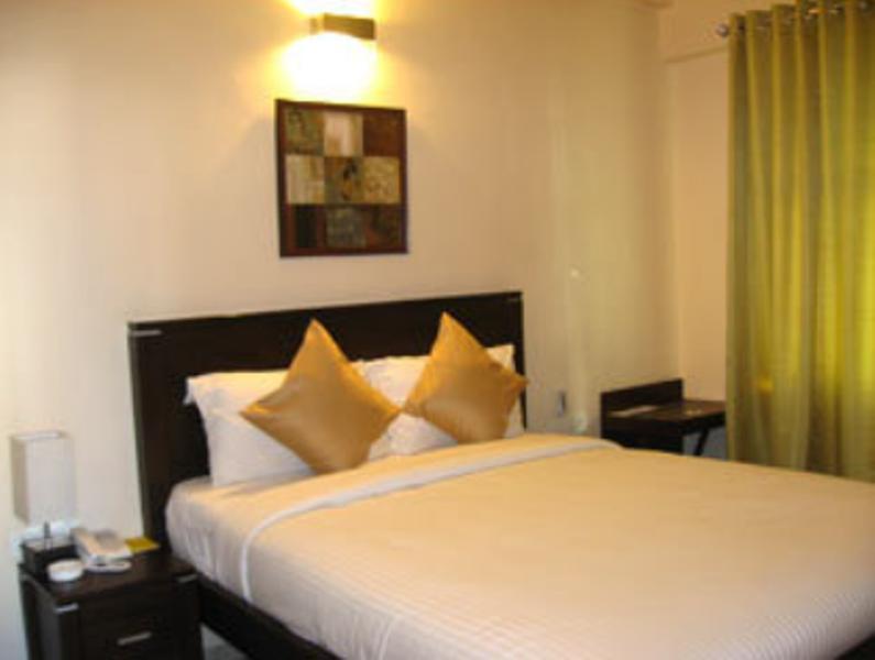 Hotel The Elite Suites Pune Chambre photo