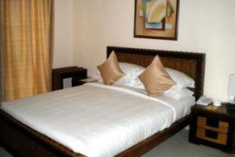 Hotel The Elite Suites Pune Chambre photo