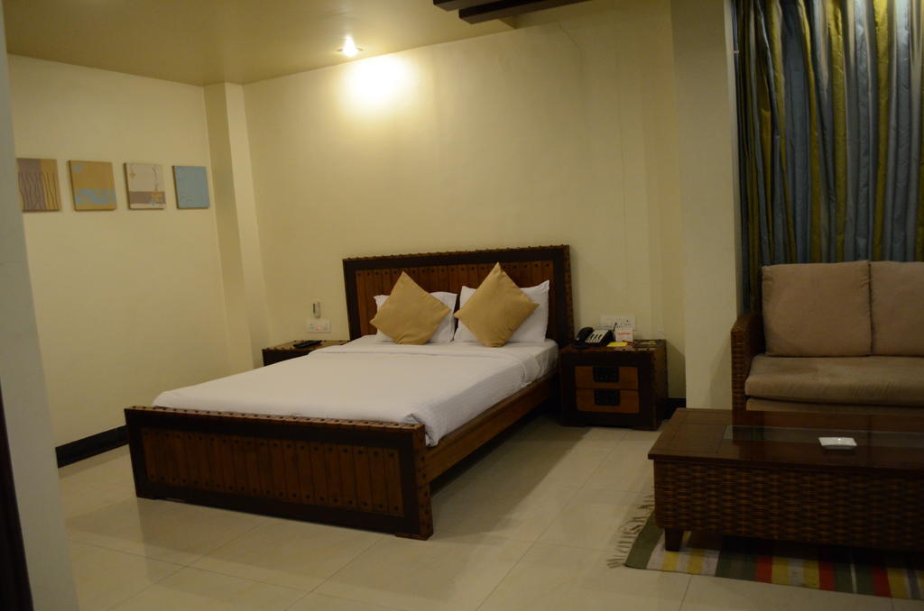 Hotel The Elite Suites Pune Chambre photo