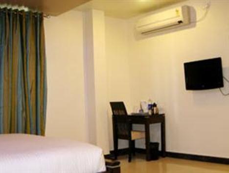 Hotel The Elite Suites Pune Chambre photo