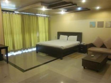 Hotel The Elite Suites Pune Chambre photo